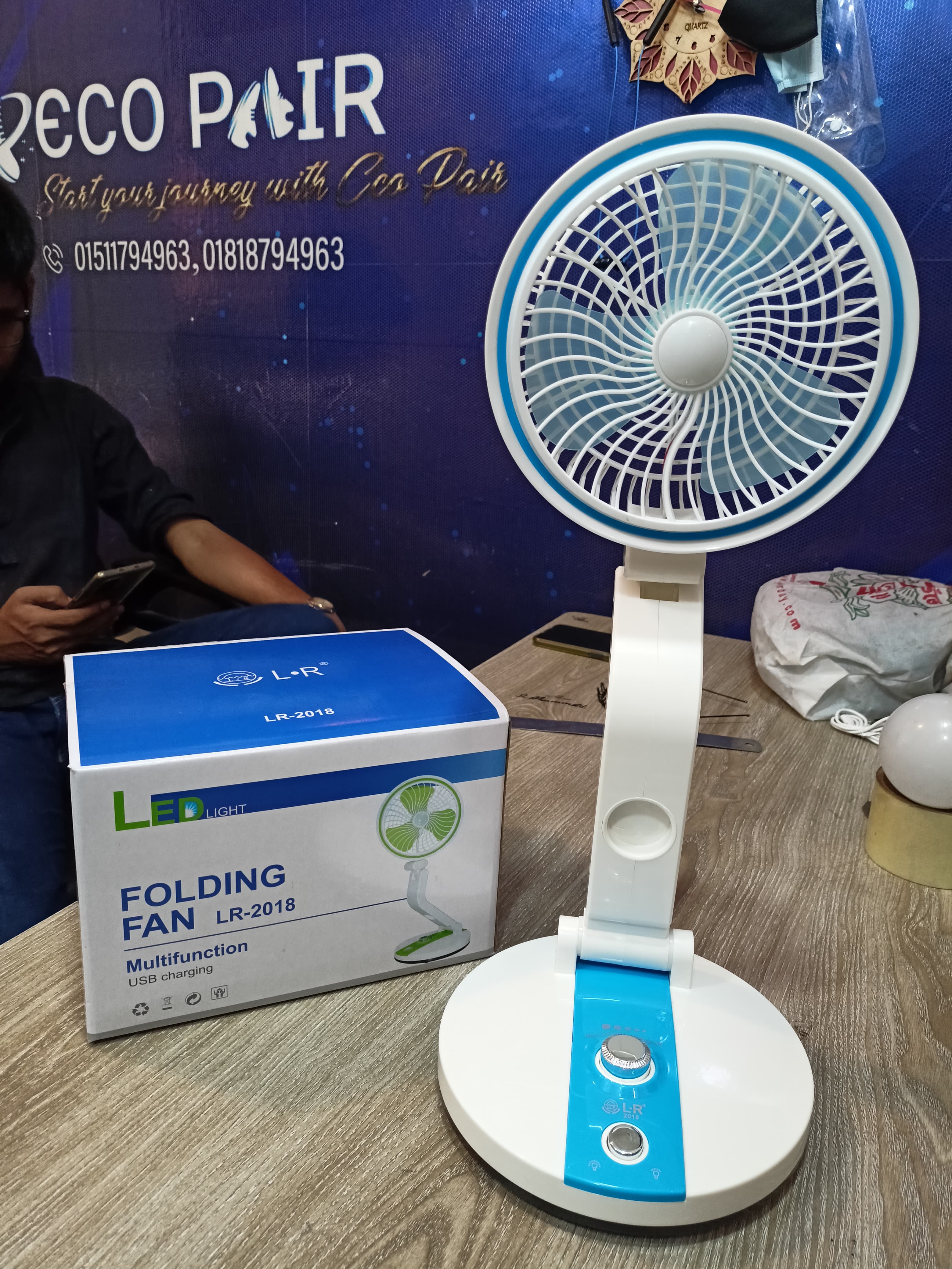 Folding fan with LED light