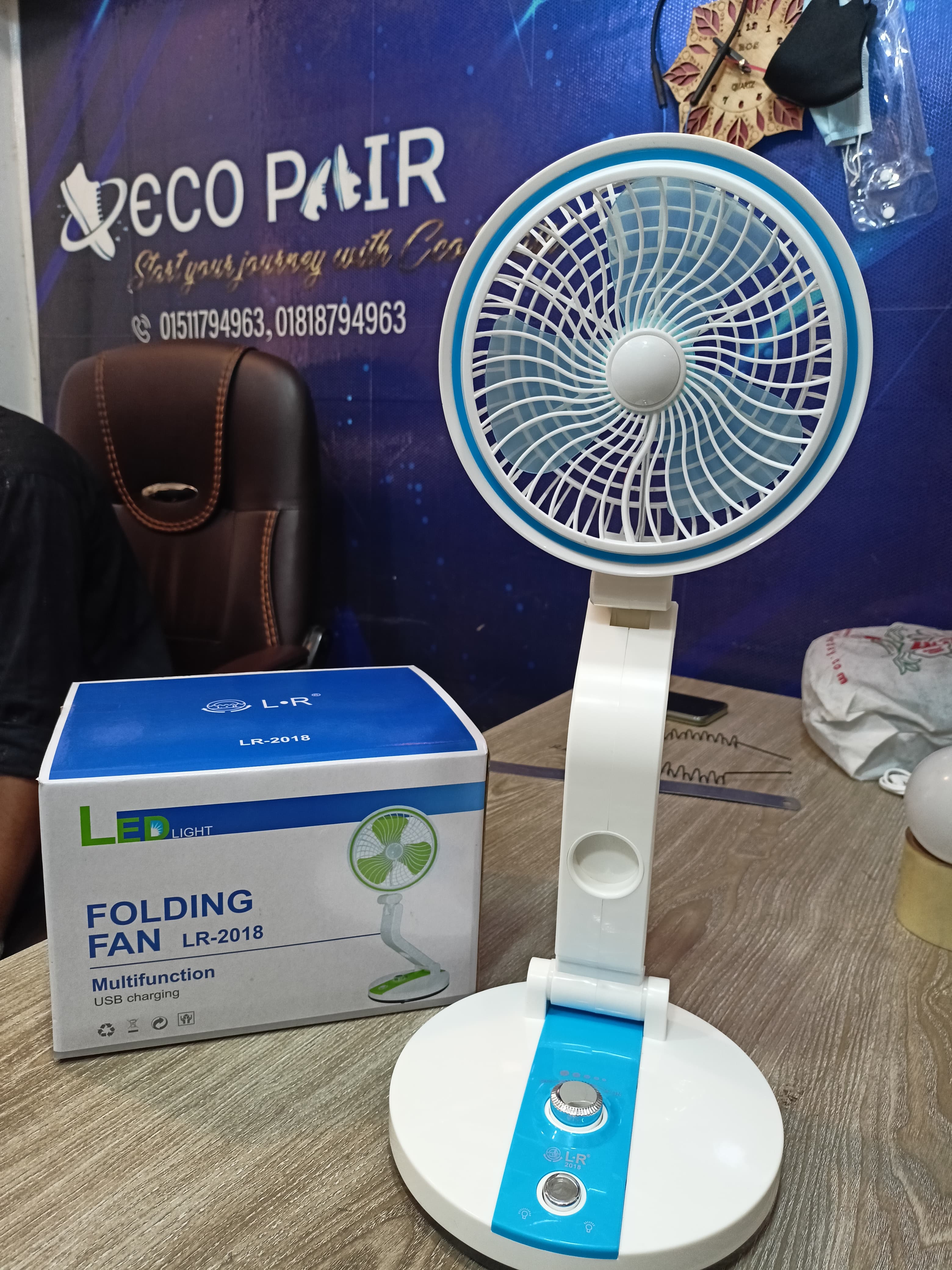 Folding fan with LED light