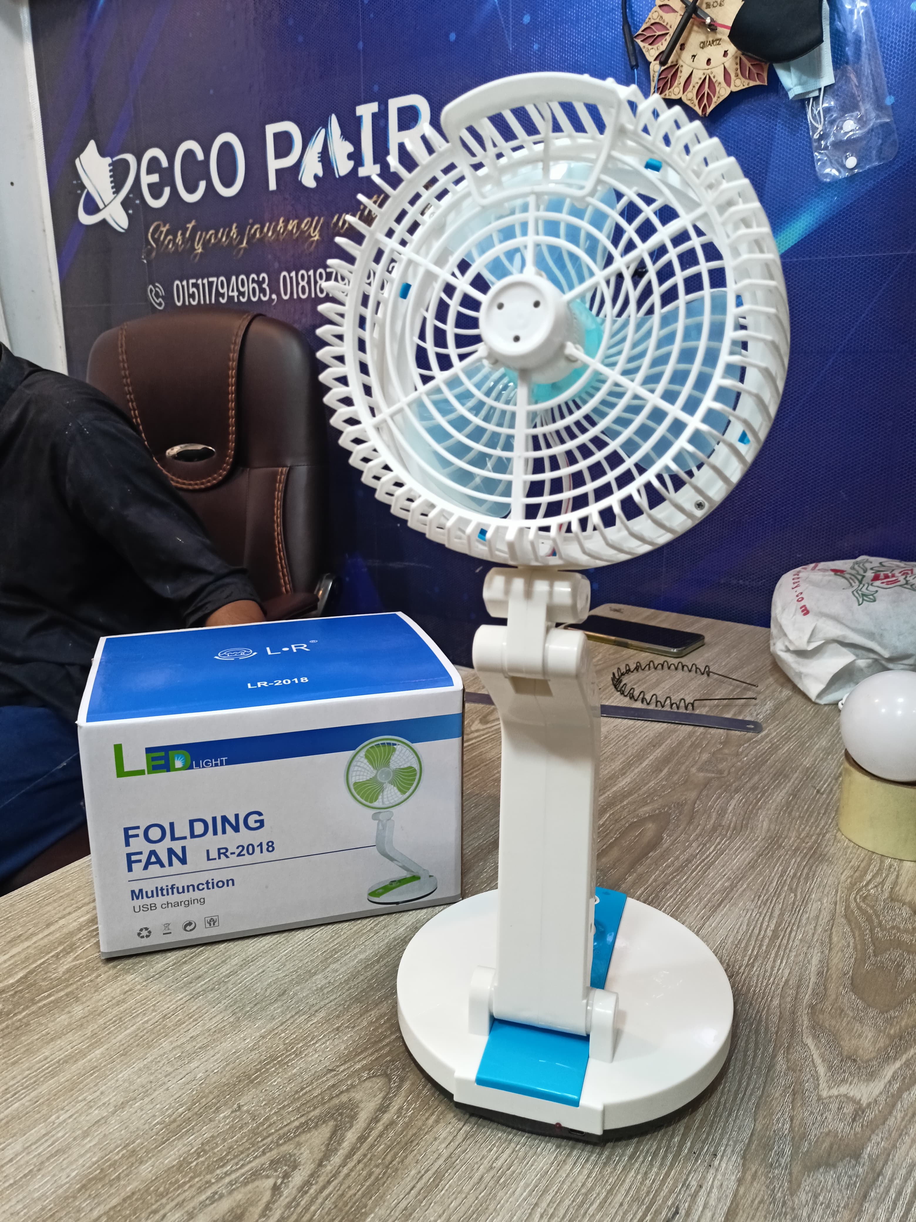 Folding fan with LED light