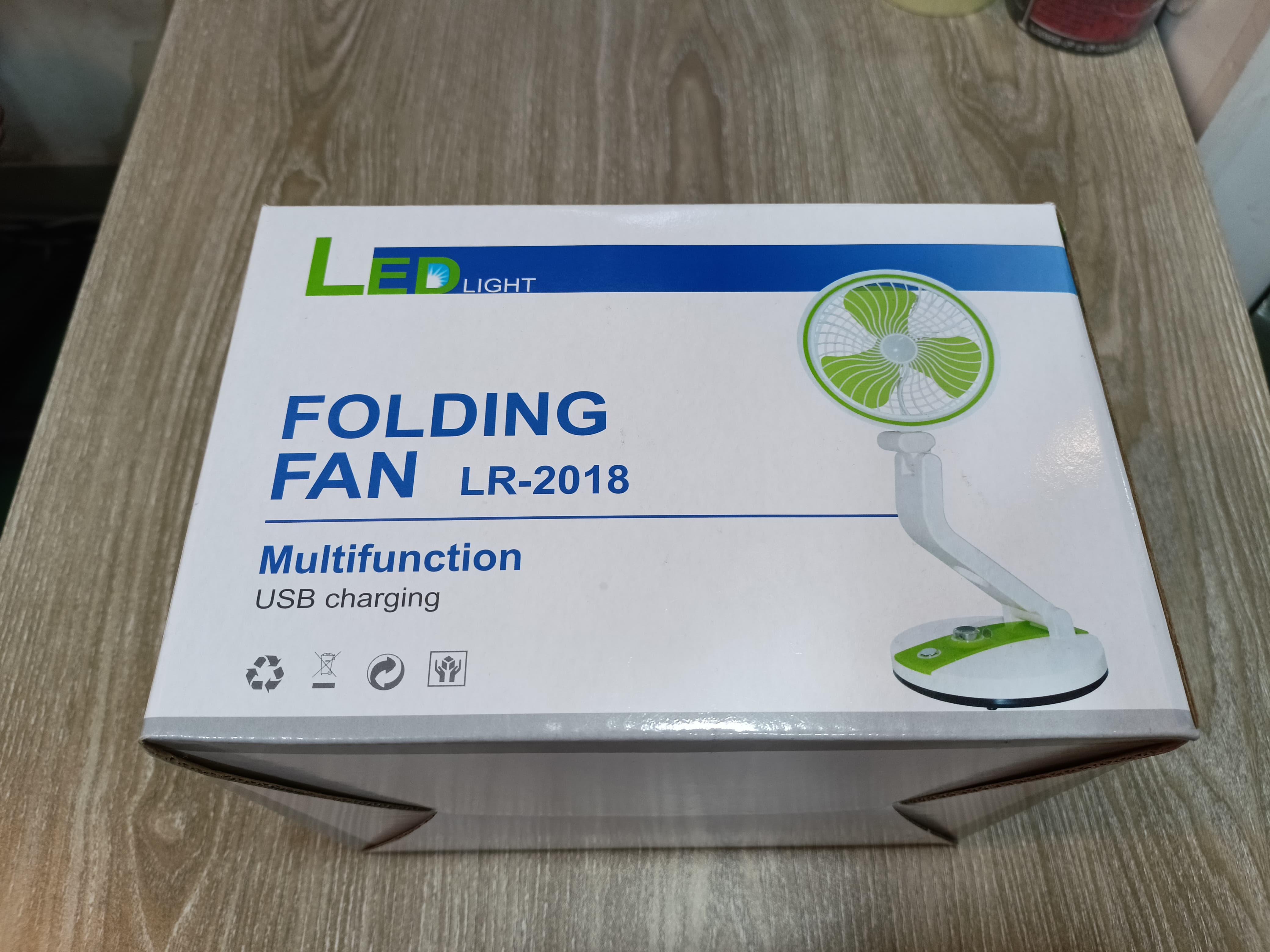 Folding fan with LED light