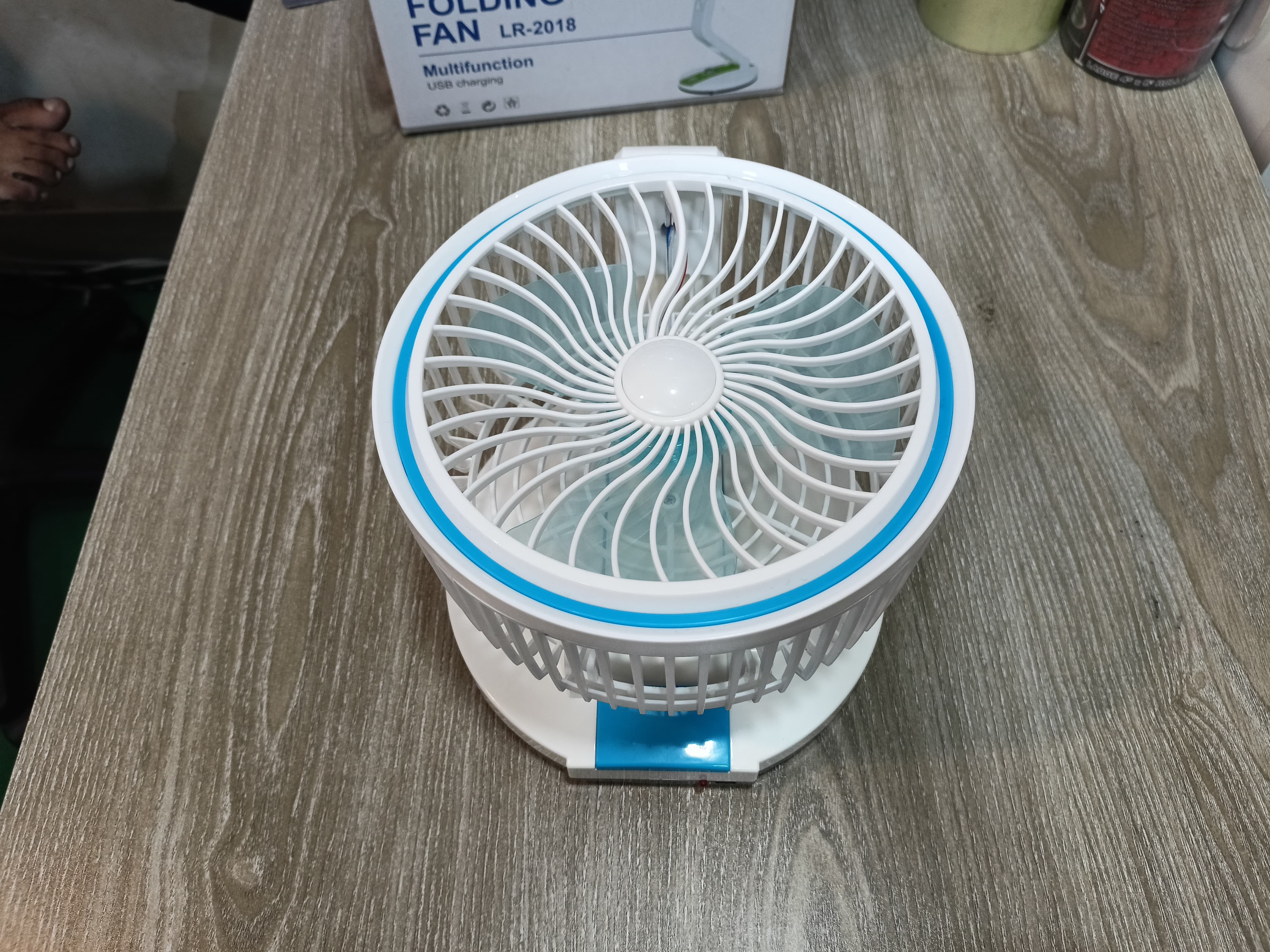 Folding fan with LED light