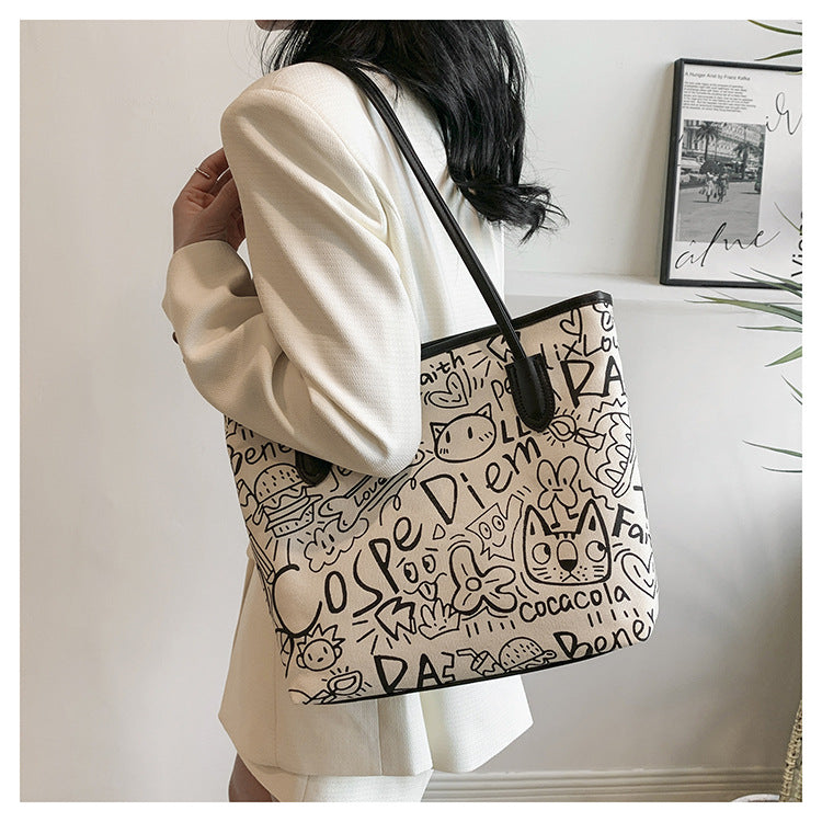 Printed canvas graffiti tote bag with doll