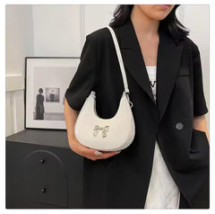 Metal bou crossbody bag